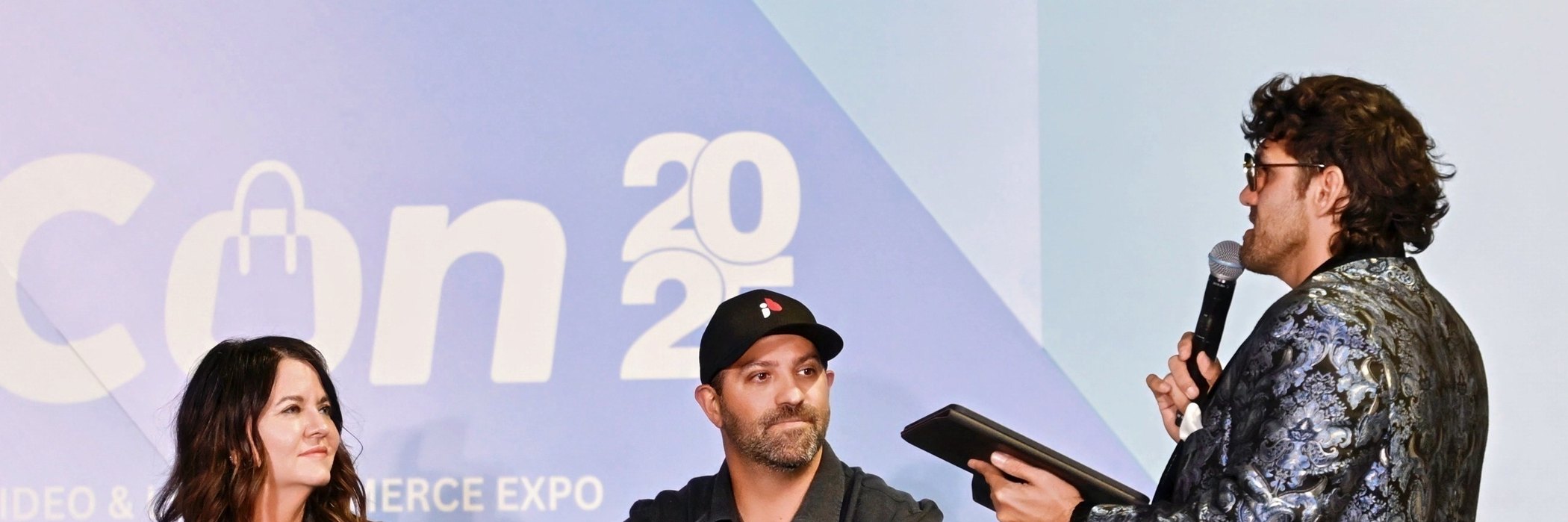 Reef hosting a panel of three founders on stage